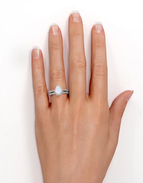 Load image into Gallery viewer, 1.5 Carat Pear Cut Lab Created Opal and Moissanite Vintage Engagement Ring - Halo Pave Bridal Set in 18K White Gold Plating for Women
