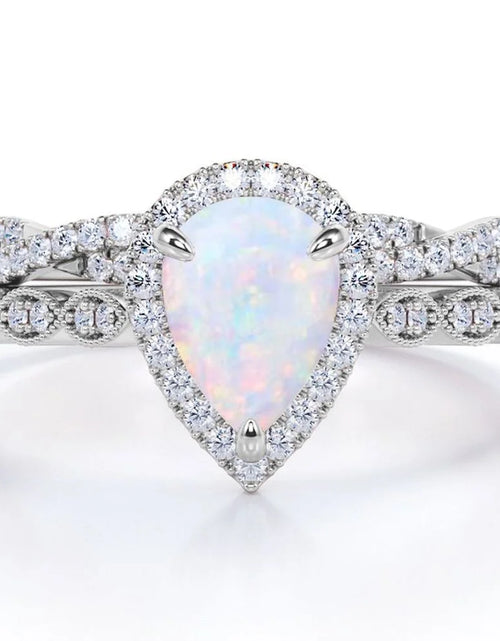 Load image into Gallery viewer, 1.5 Carat Pear Cut Lab Created Opal and Moissanite Vintage Engagement Ring - Halo Pave Bridal Set in 18K White Gold Plating for Women
